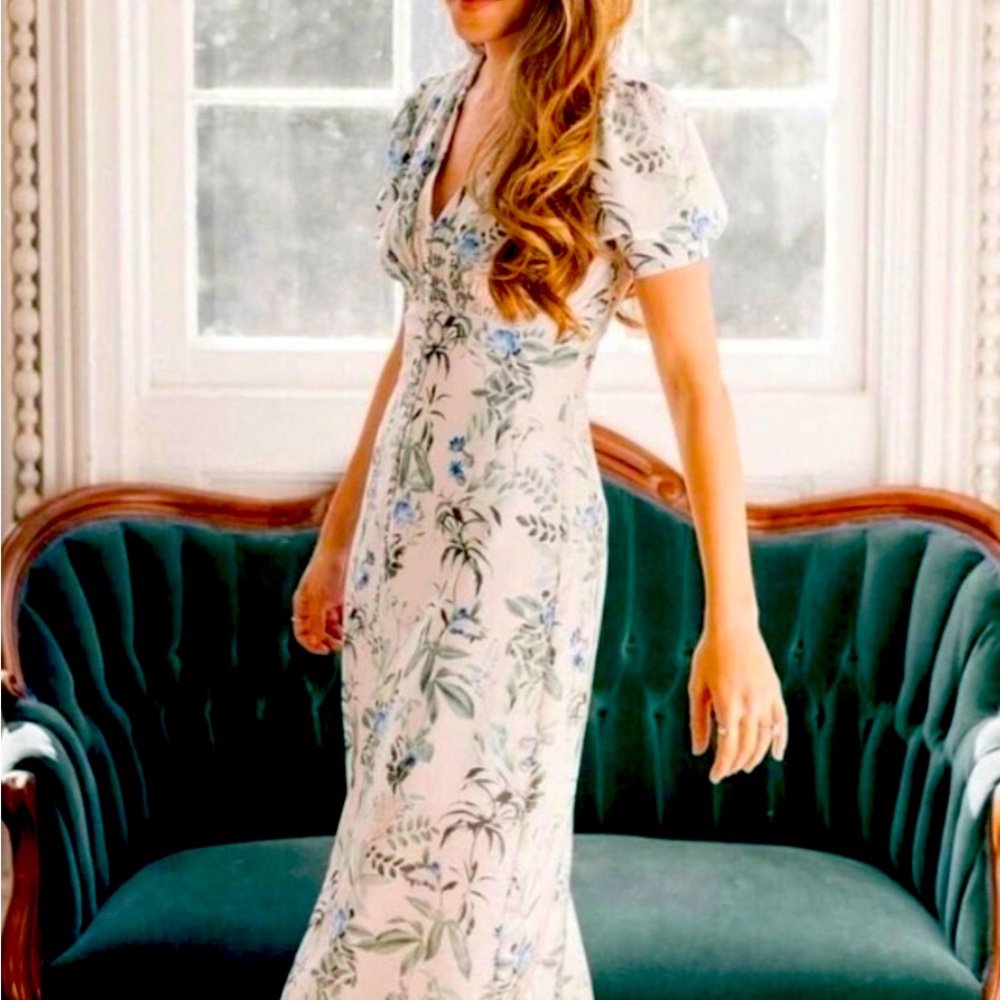 Gal Meets Glam vintage style blue& green botanical on a creme background.